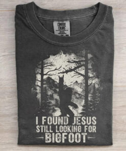 I Found Jesus Still Looking For Bigfoot T-Shirt Funny Sasquatch Merch Gift For Believers - Homegiftaura
